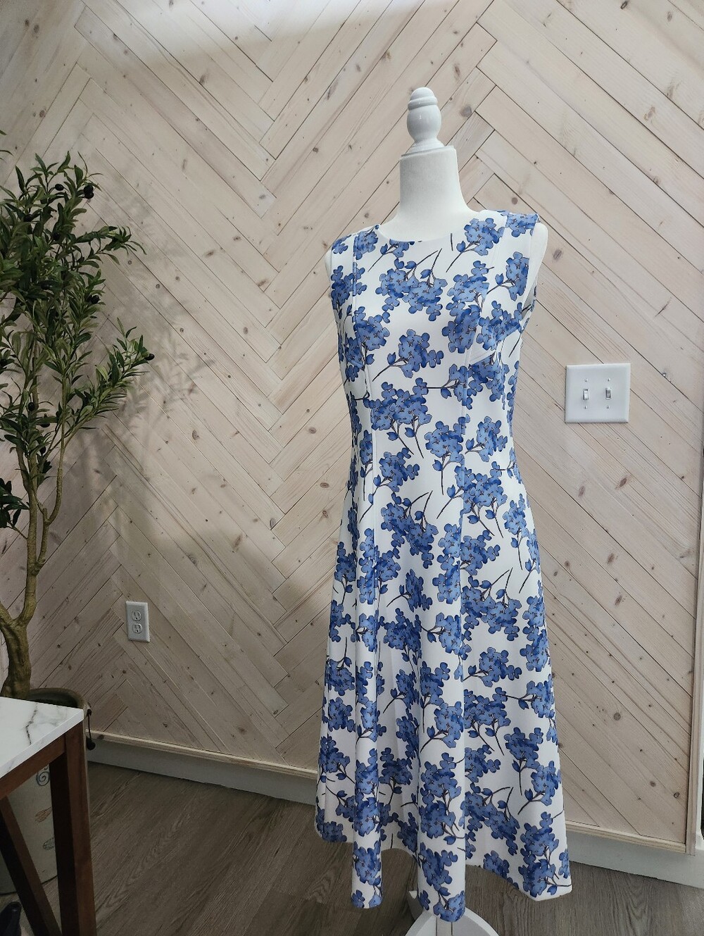 Sleeveless White Dress with Blue Floral Print